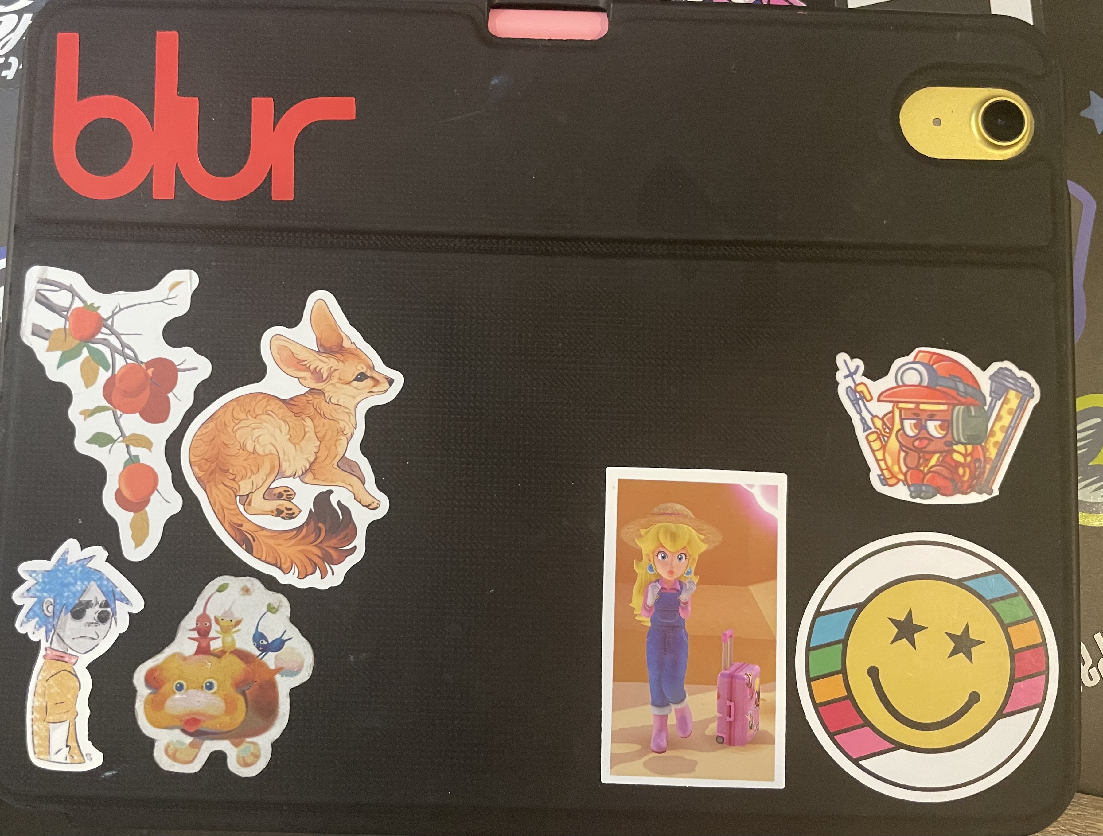 My iPad with my newly made Blur sticker.