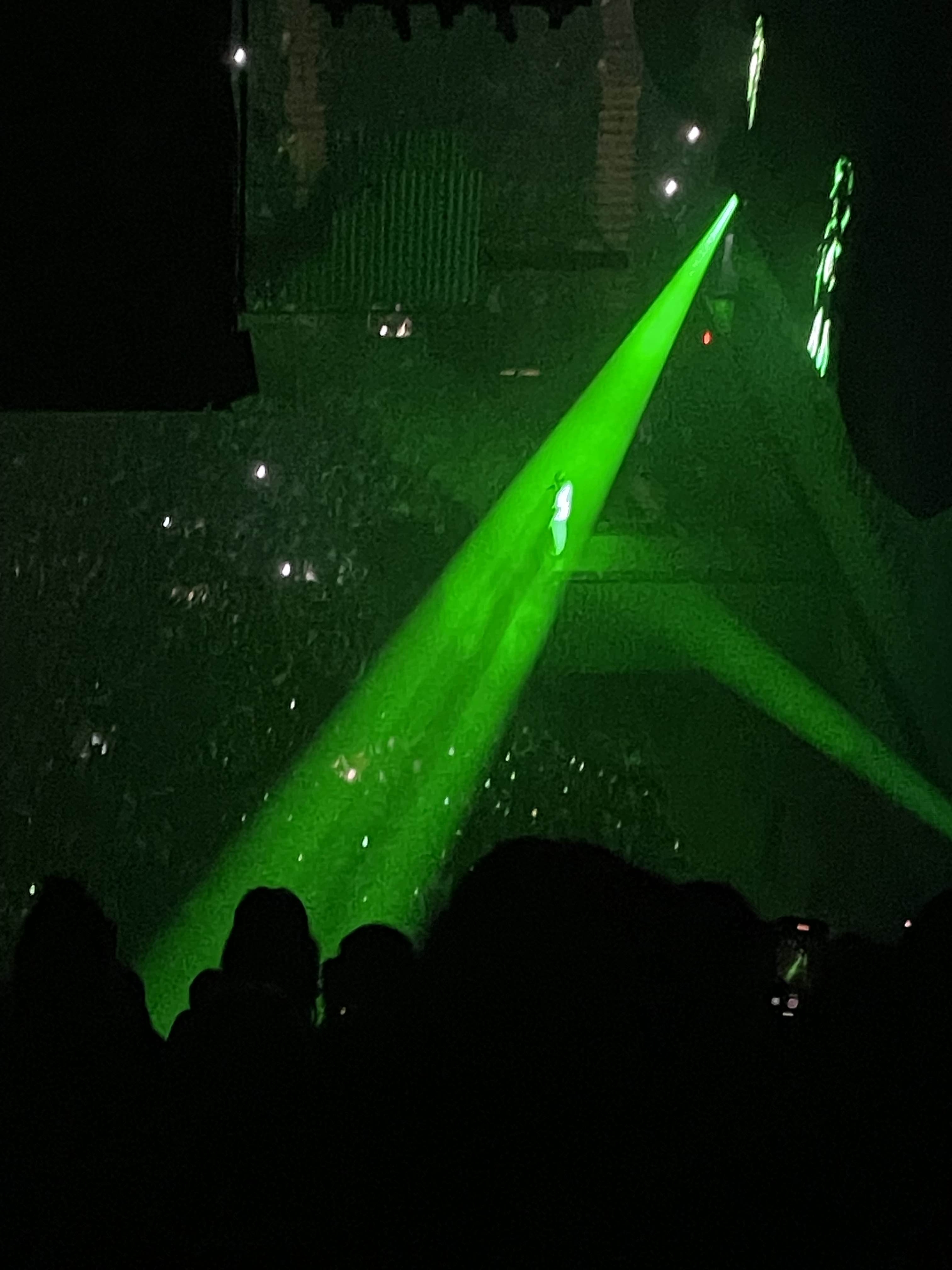 cool pic of a single green spotlight on him